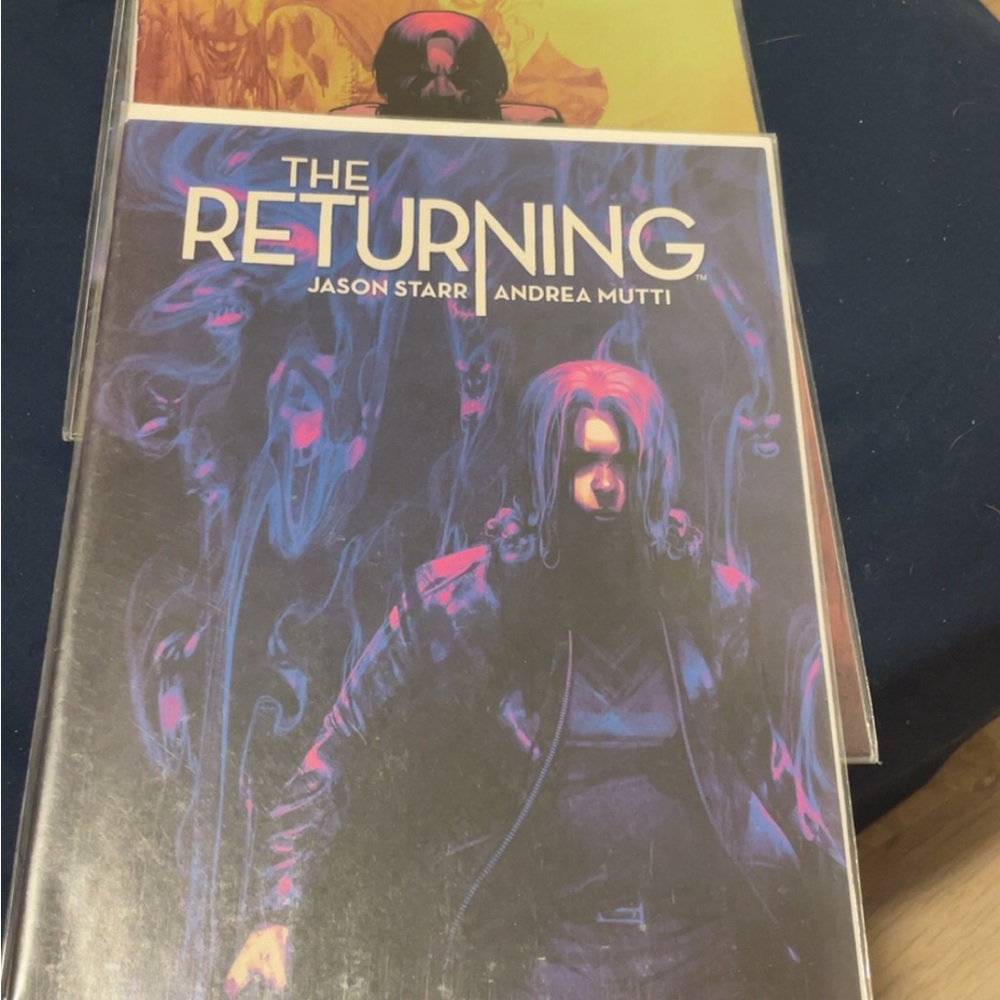 The Returning Graphic Novel - Dark Purple & Blue Cover